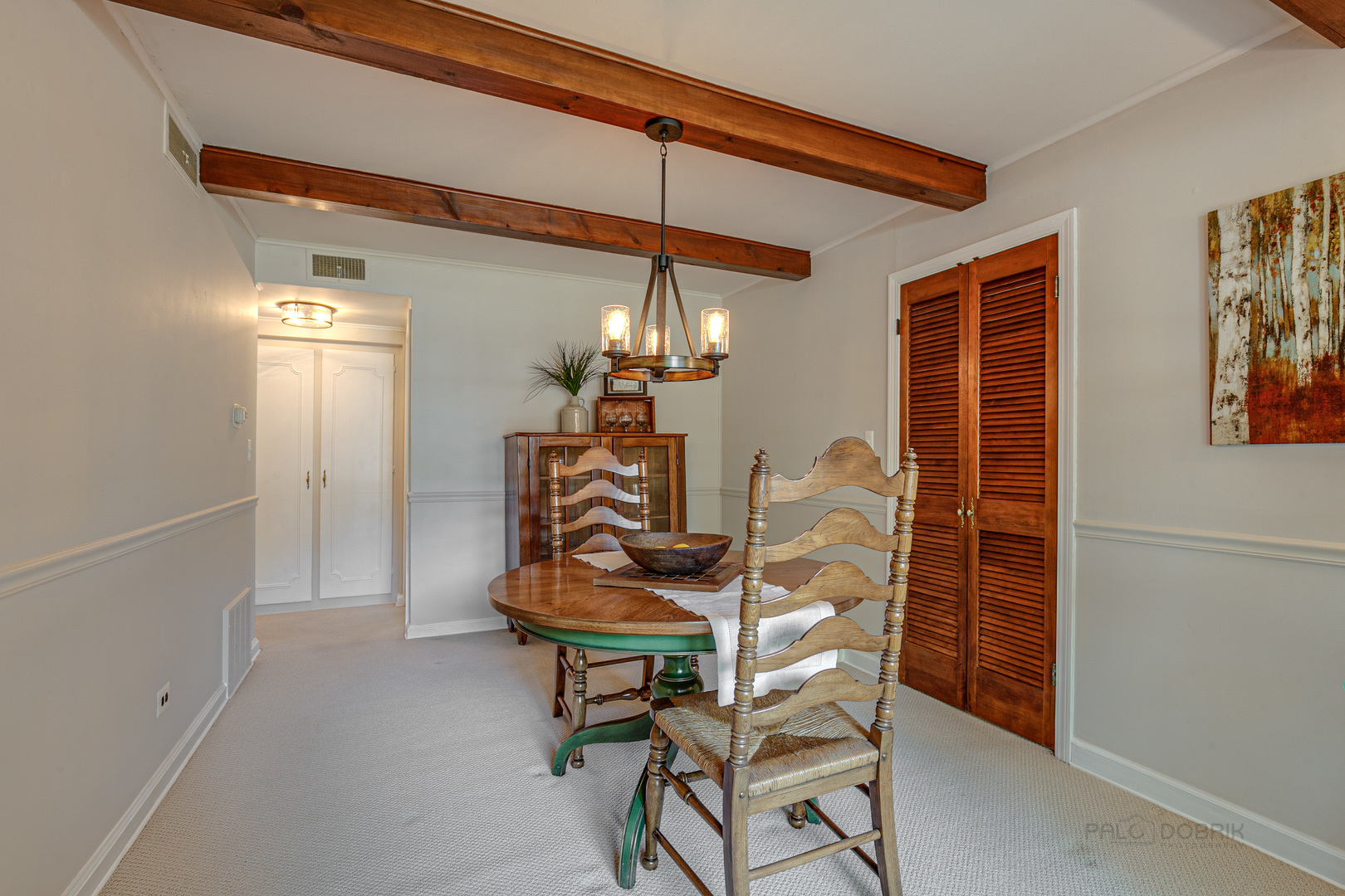 38 Golfview Road Lake Zurich, IL 60047 - Photo 15 of 27 a view of a dining room with furniture and chandelier