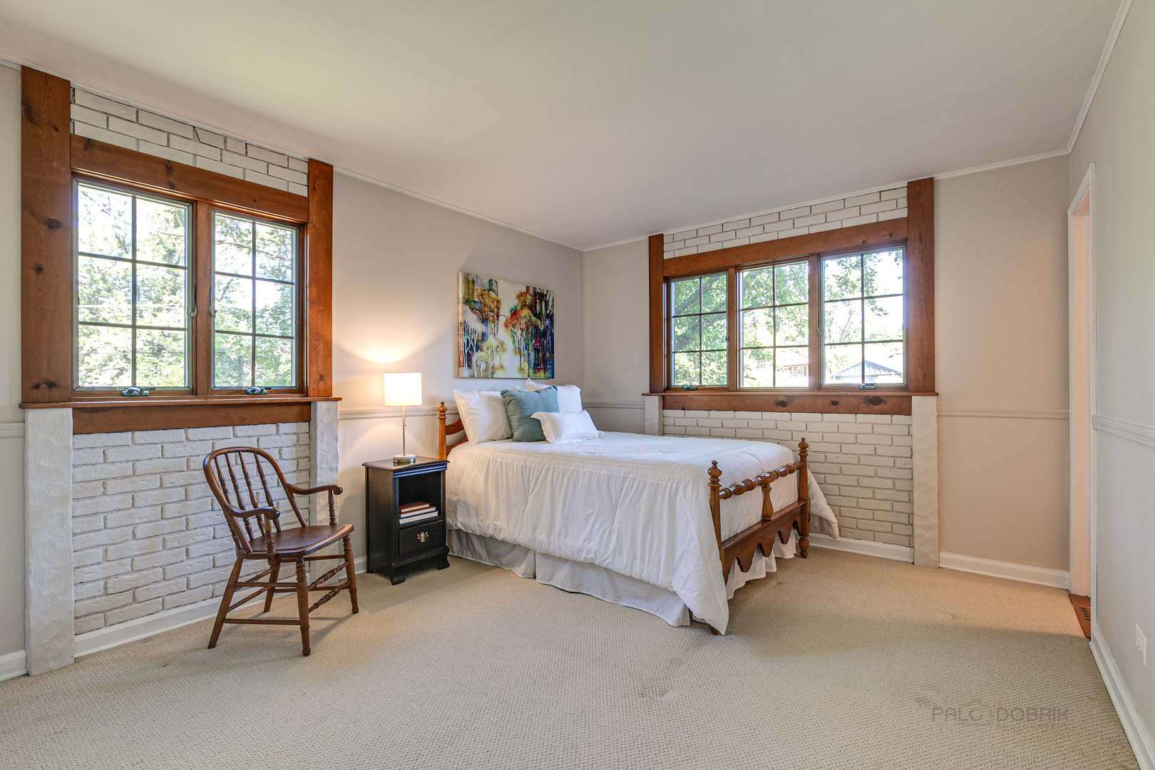 38 Golfview Road Lake Zurich, IL 60047 - Photo 16 of 27 a bed room with a bed and a chair