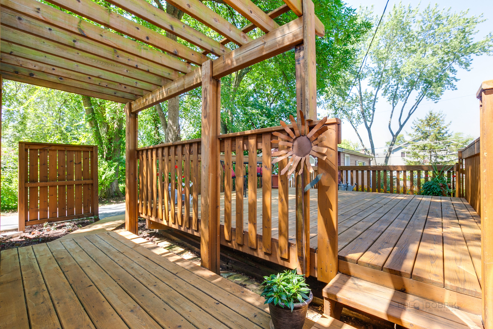 38 Golfview Road Lake Zurich, IL 60047 - Photo 22 of 27 a view of outdoor space with wooden floor and plants