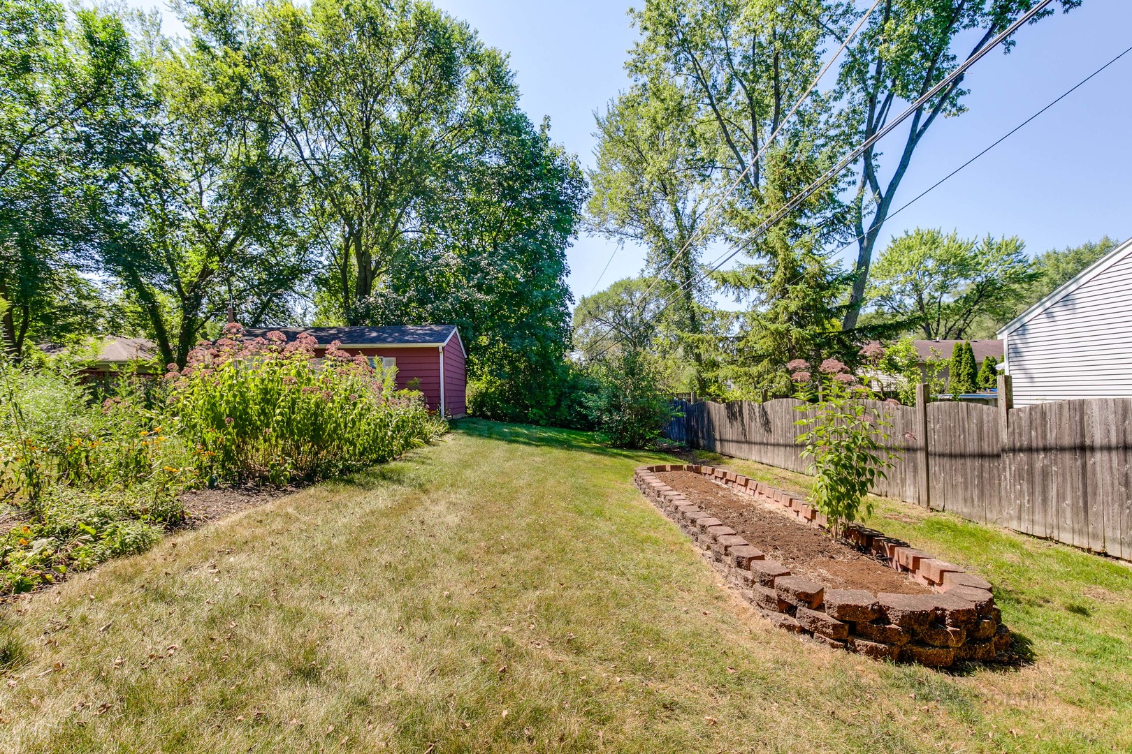 38 Golfview Road Lake Zurich, IL 60047 - Photo 26 of 27 a front view of a house with a yard