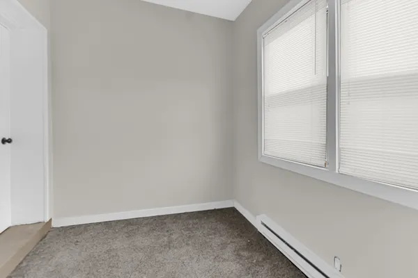 an empty room with window