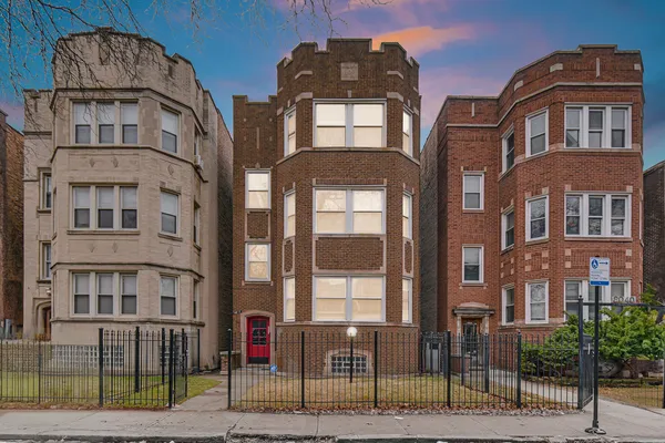 a front view of a multi story residential apartment building