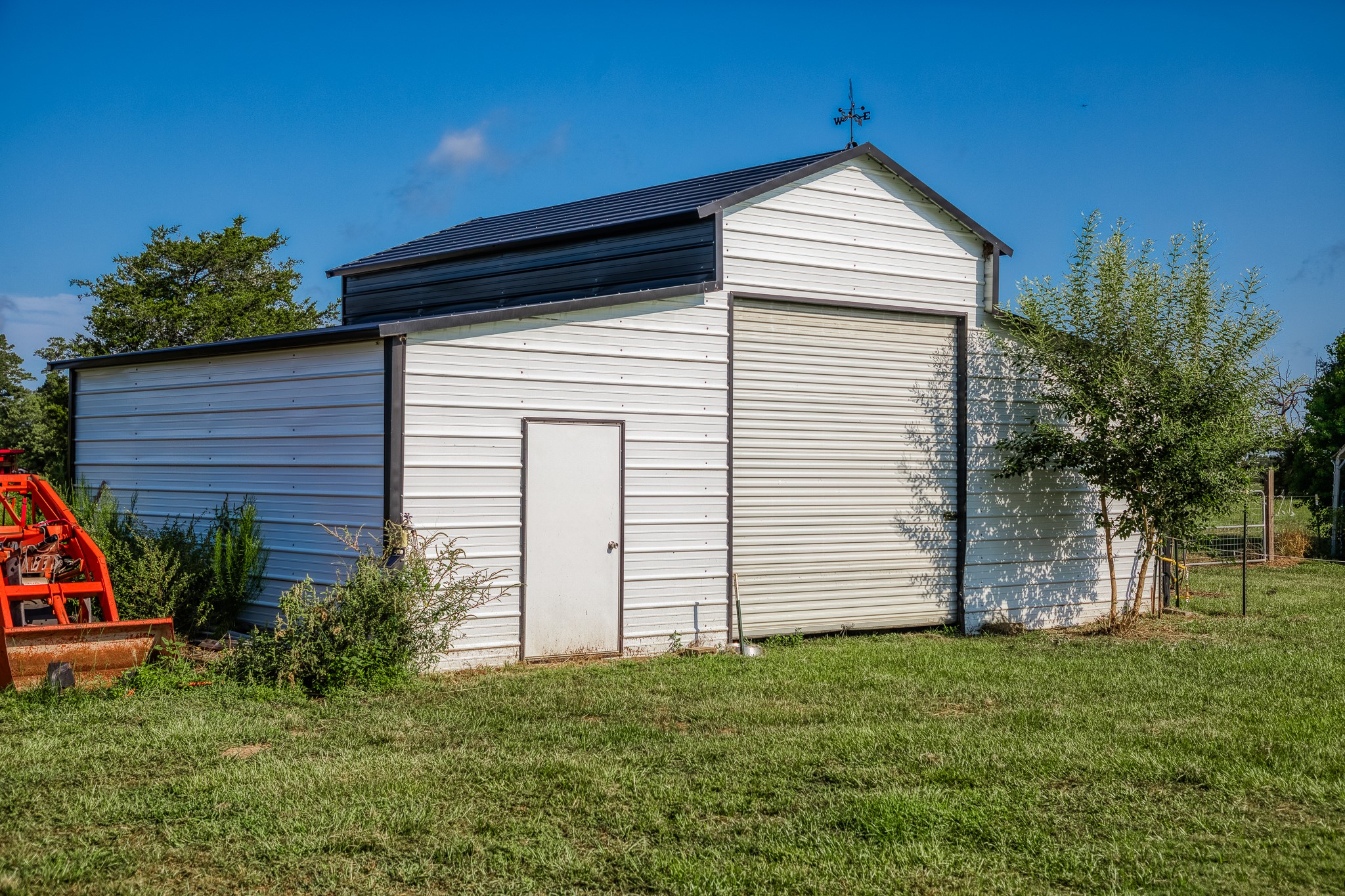 10347 Pless Road Cat Spring, TX 78933 - Photo 14 of 19 a front view of a house with a yard