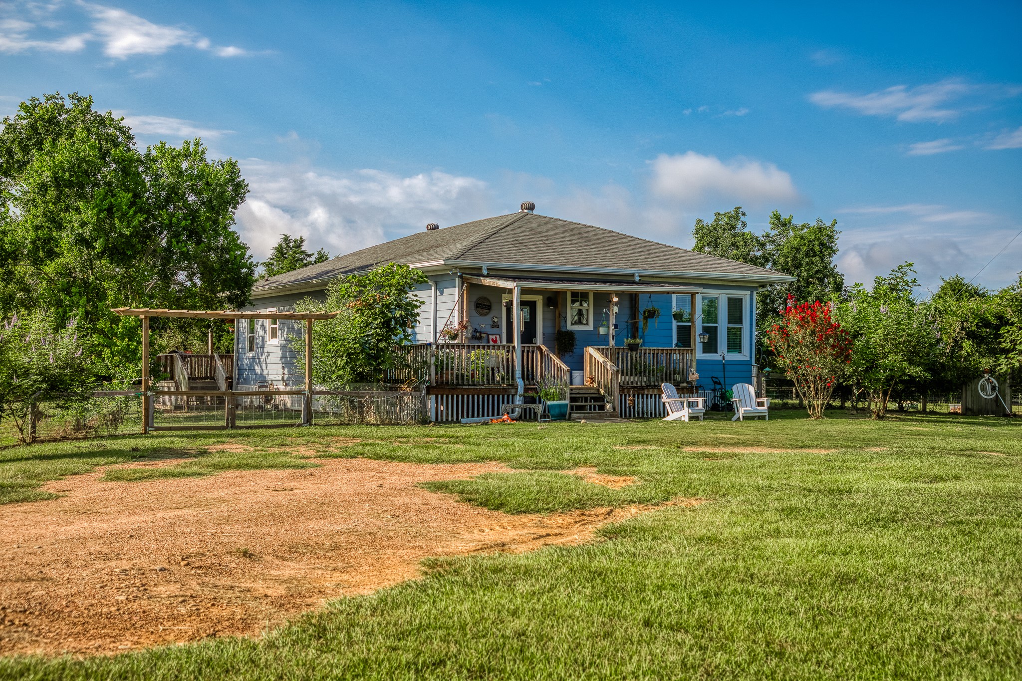 10347 Pless Road Cat Spring, TX 78933 - Photo 5 of 19 a view of a house with a yard