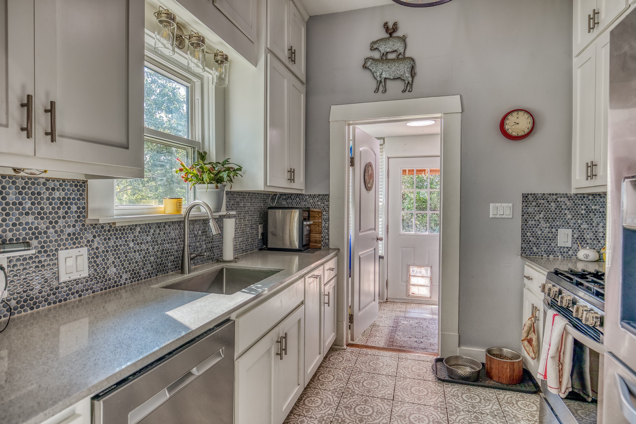10347 Pless Road Cat Spring, TX 78933 - Photo 9 of 19 a bathroom with a sink a mirror and a shower