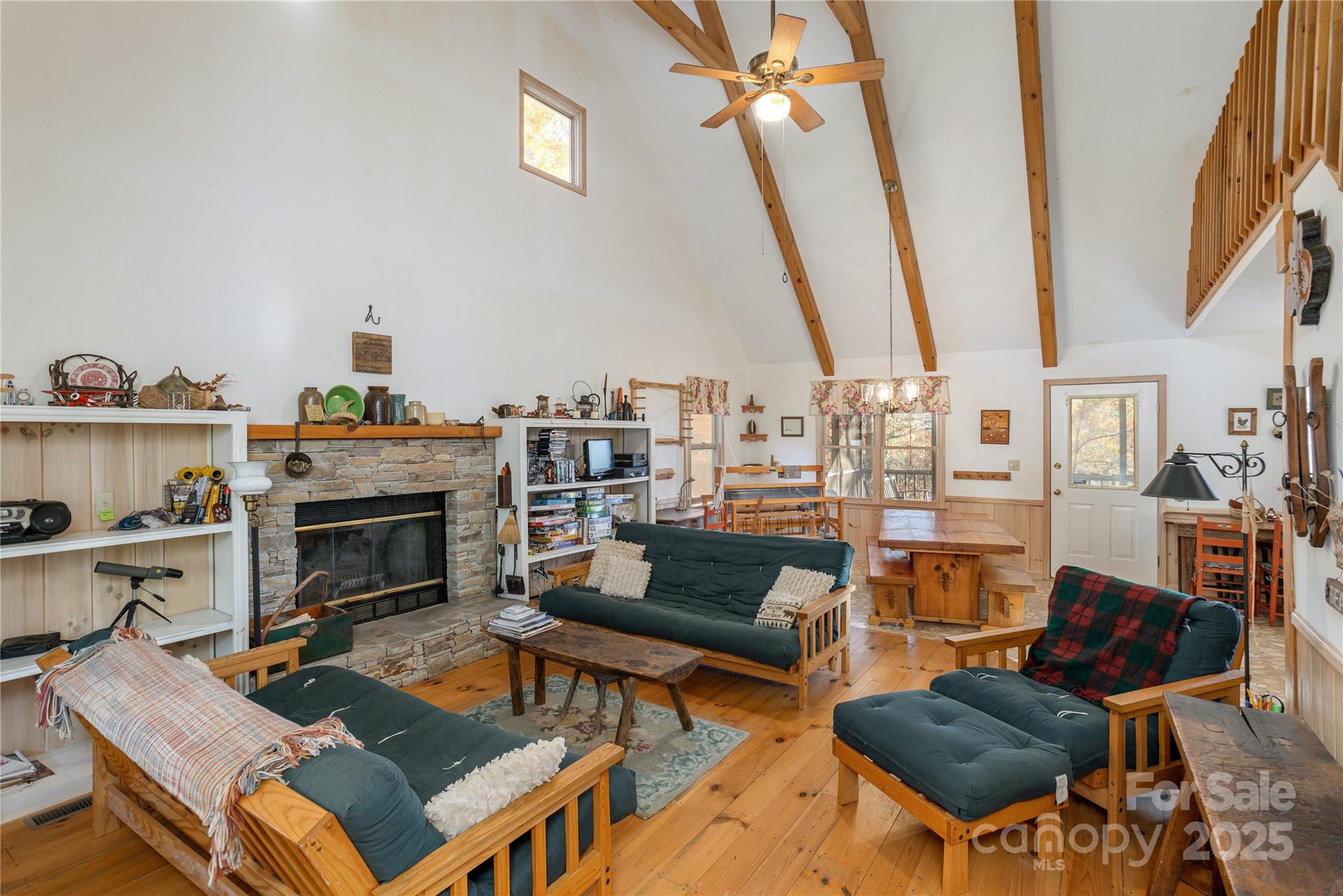 2355 Round Mountain Road Brevard, NC 28712 - Photo 5 of 27 a living room with furniture and a fireplace