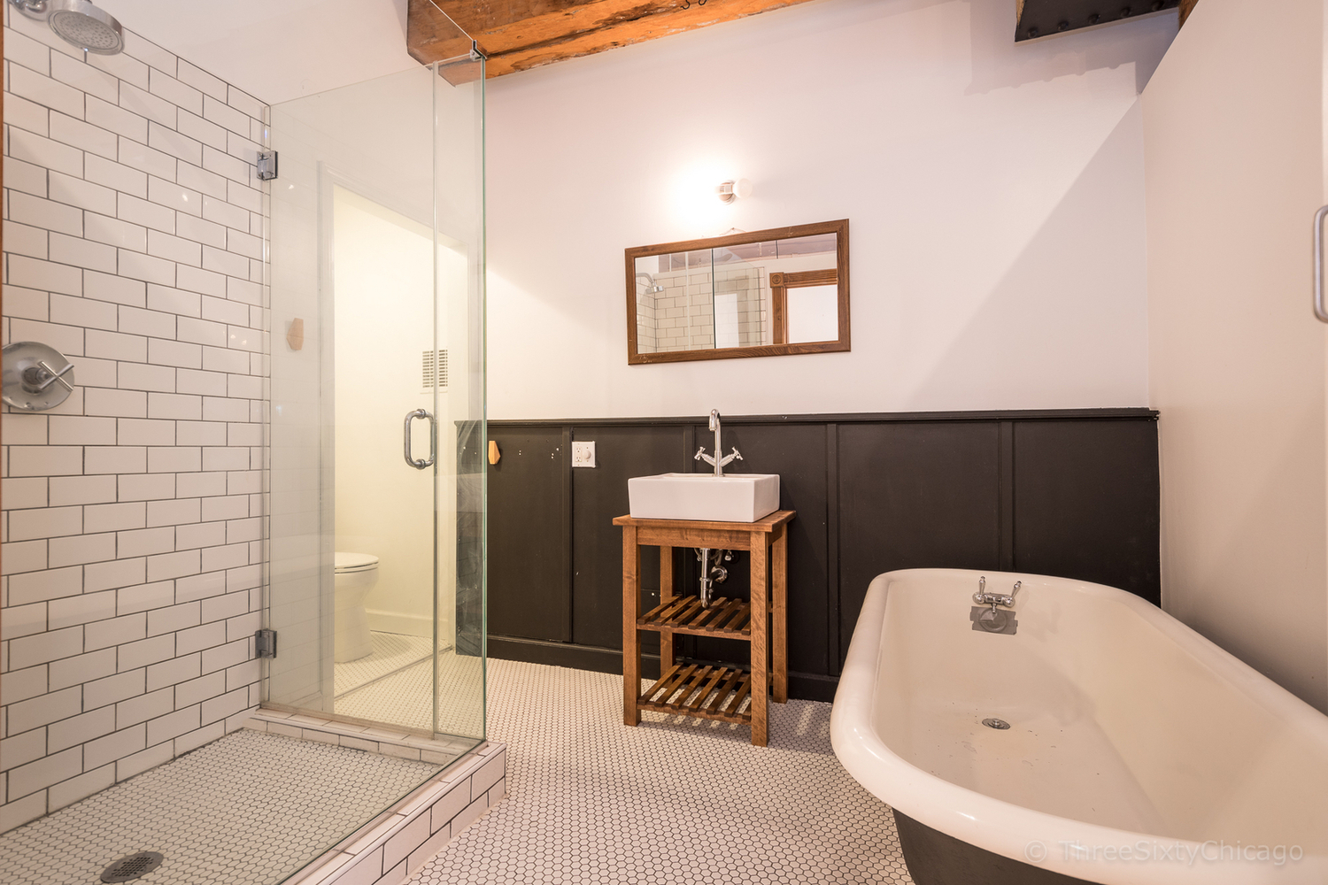 711 South Dearborn Street, Unit 508 Chicago, IL 60605 - Photo 12 of 16 a bathroom with a sink a toilet and shower