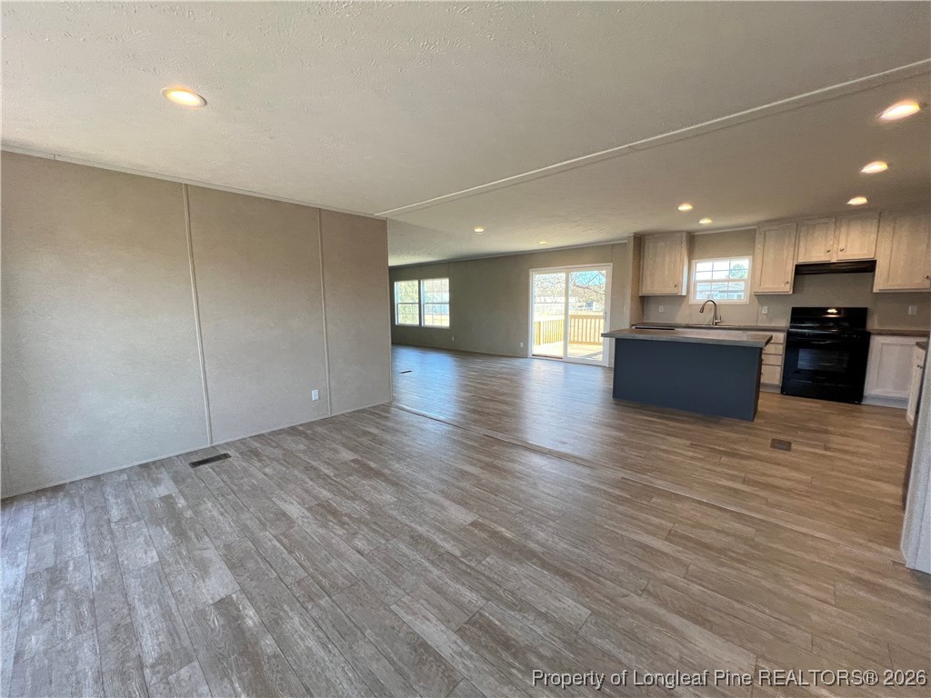 801 Horseshoe Road Autryville, NC 28318 - Photo 10 of 31 living room view to kitchen