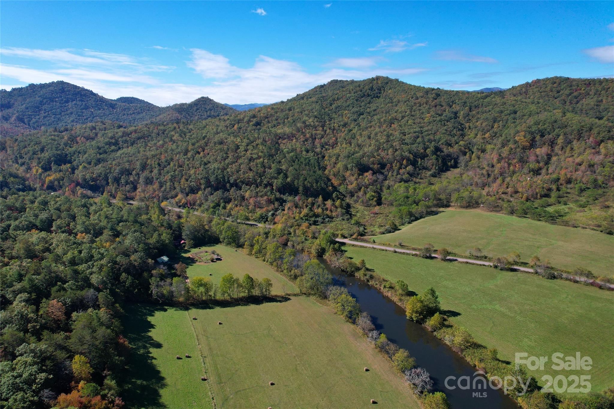 4136 Rose Creek Road Franklin, NC 28734 - Photo 17 of 37 a view of a city with mountains in the background