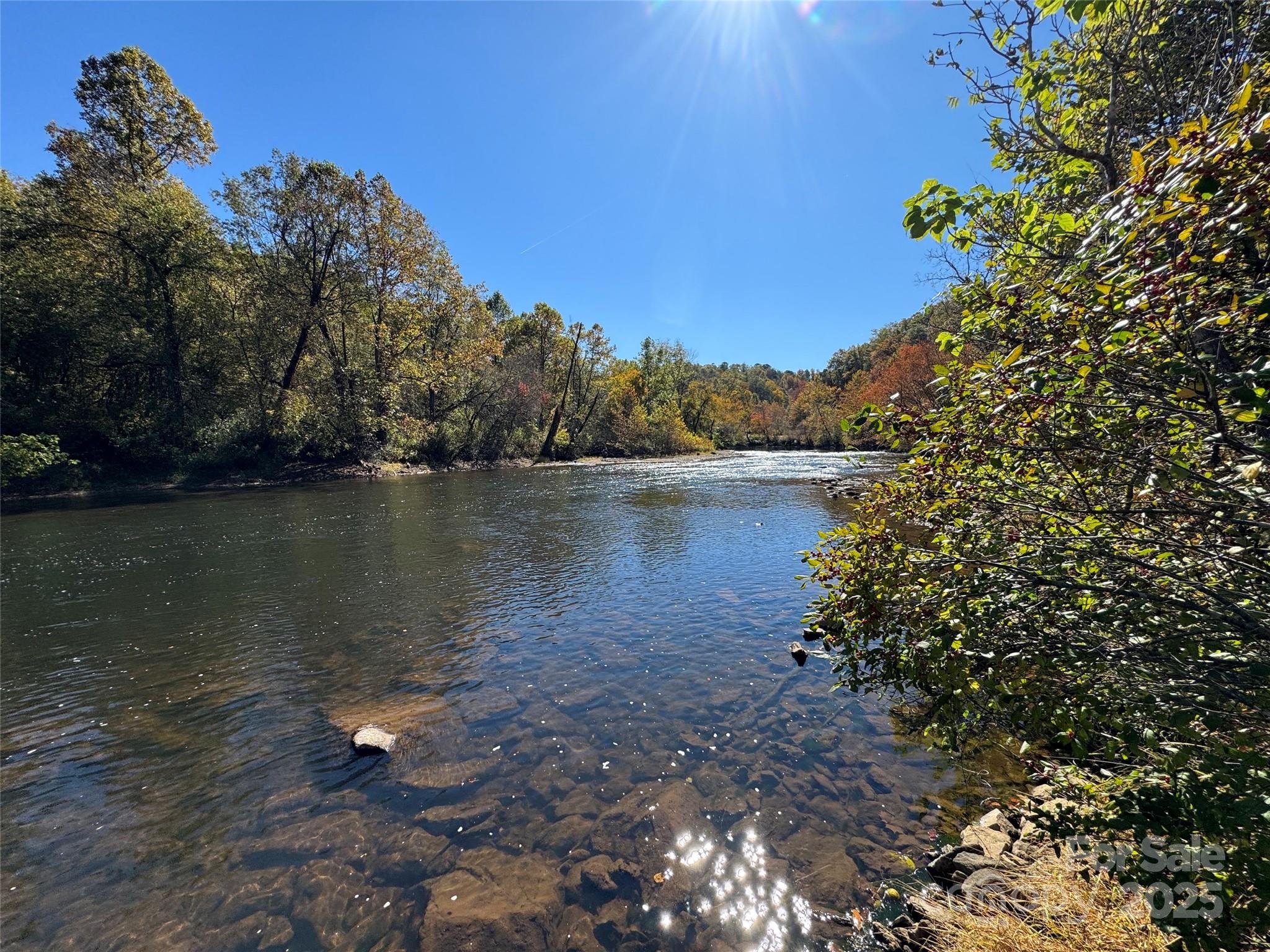 4136 Rose Creek Road Franklin, NC 28734 - Photo 23 of 37 a view of a lake with houses