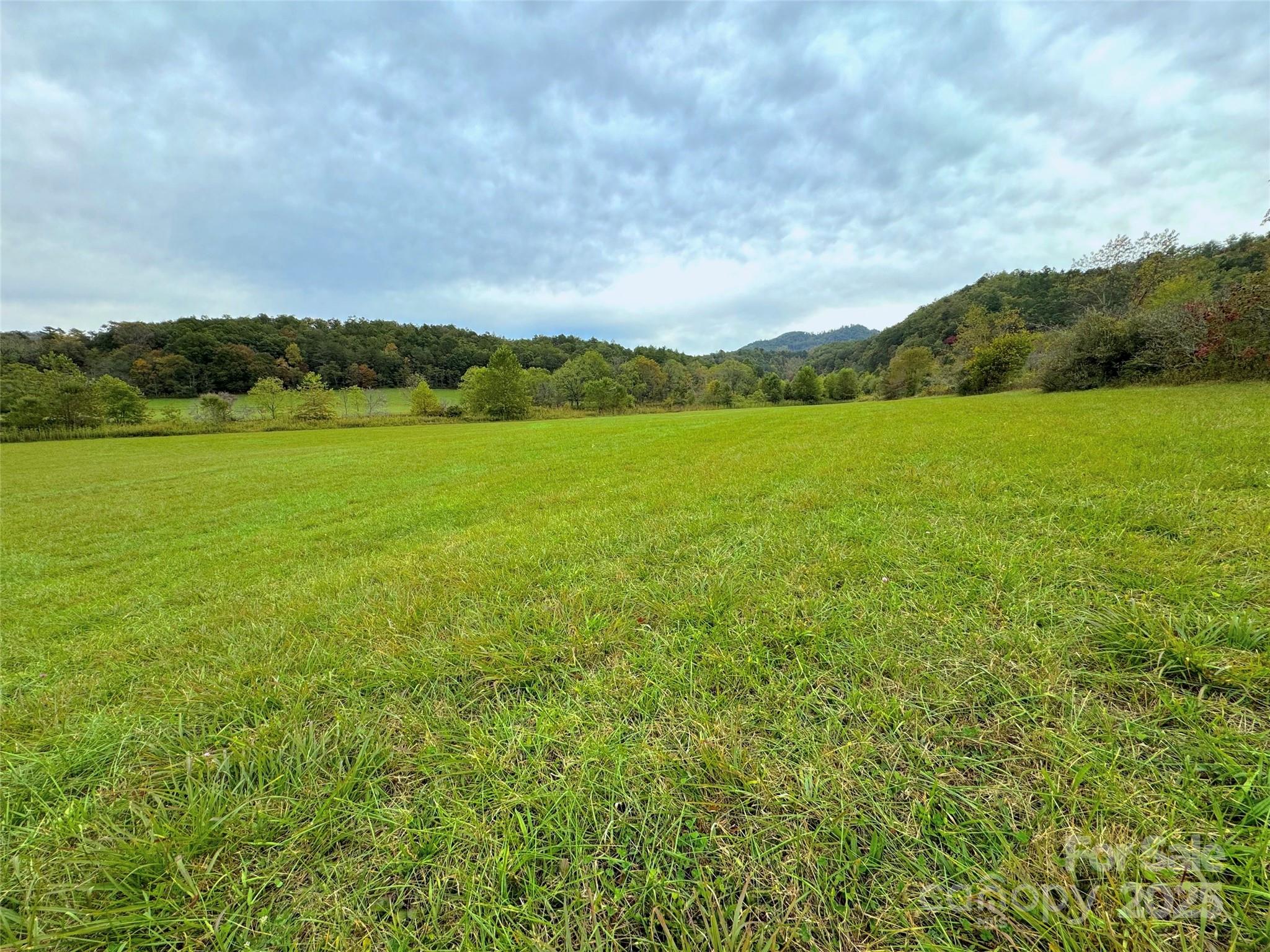 4136 Rose Creek Road Franklin, NC 28734 - Photo 32 of 37 a view of an ocean and a mountain