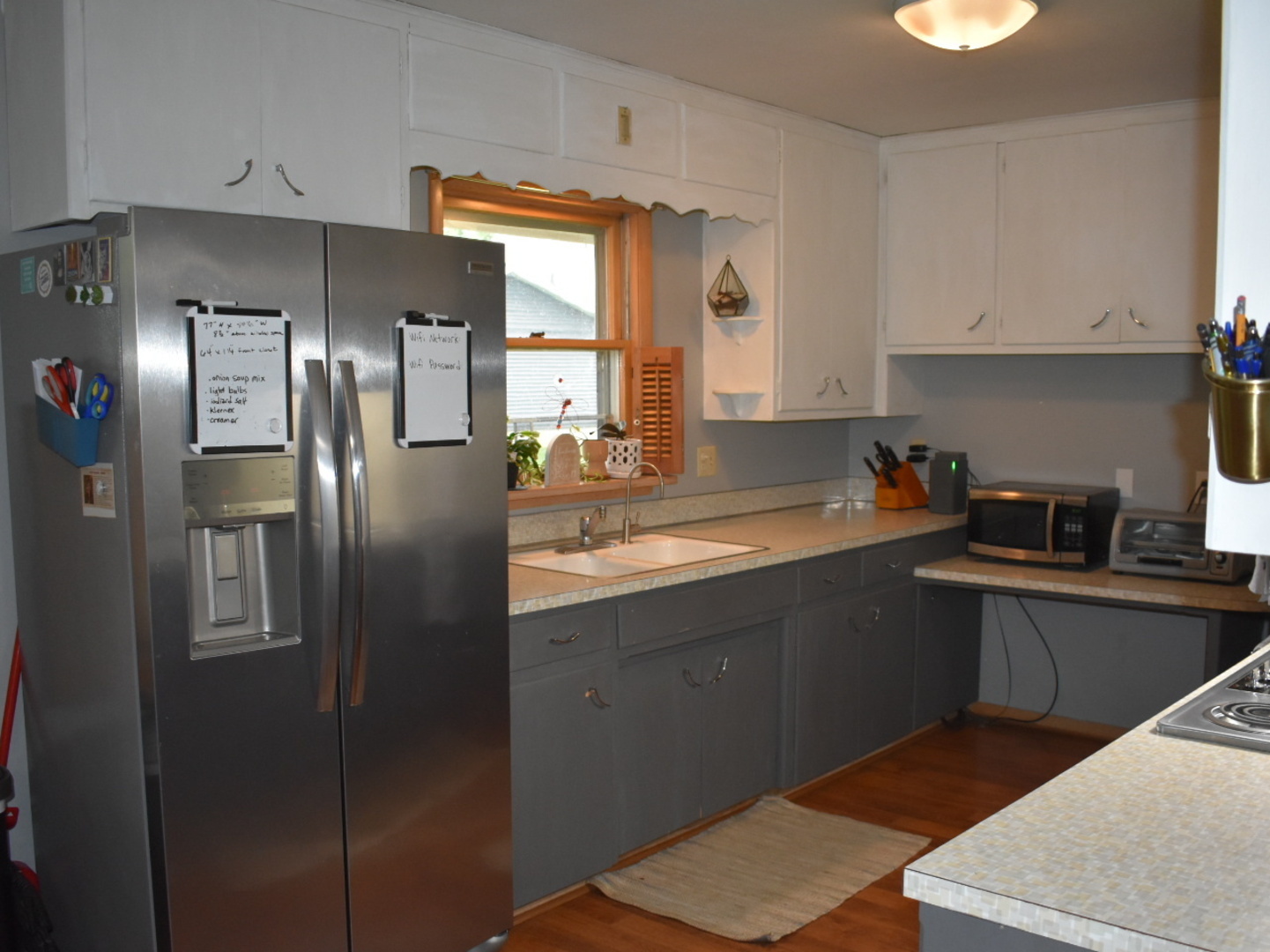 405 Prairie Court Streator, IL 61364 - Photo 8 of 16 a kitchen with stainless steel appliances granite countertop a sink stove and refrigerator