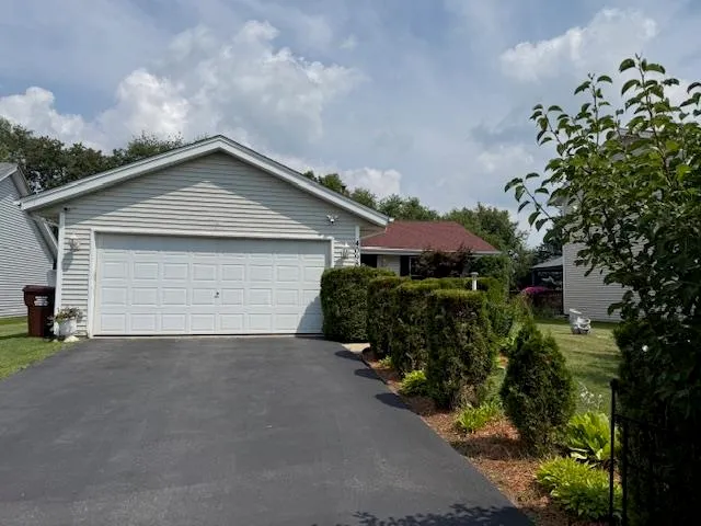 front view of a house with a garage