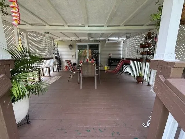 a view of a porch with furniture