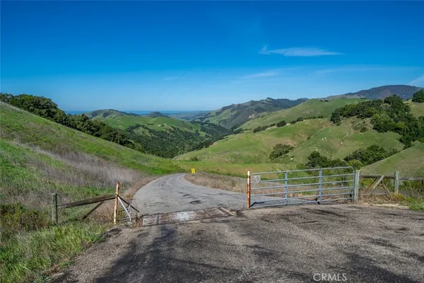 a view of a road with a yard