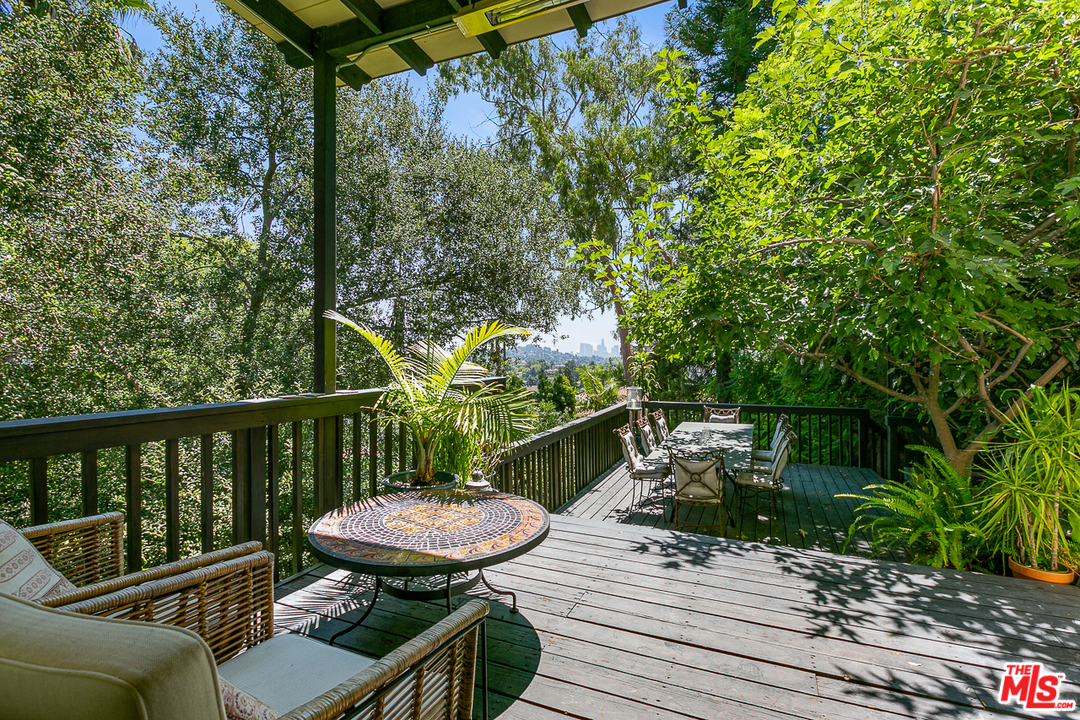 4458 Dundee Drive Los Angeles, CA 90027 - Photo 15 of 20 a view of a balcony with furniture