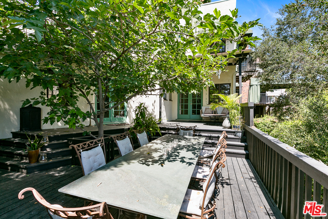4458 Dundee Drive Los Angeles, CA 90027 - Photo 16 of 20 a view of a patio with wooden floor