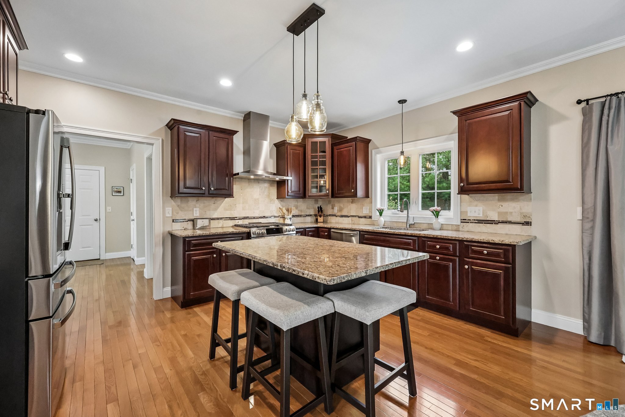 2 Gatehouse Road Granby, CT 06035 - Photo 11 of 40 a kitchen with stainless steel appliances granite countertop a stove a sink a refrigerator and a microwave