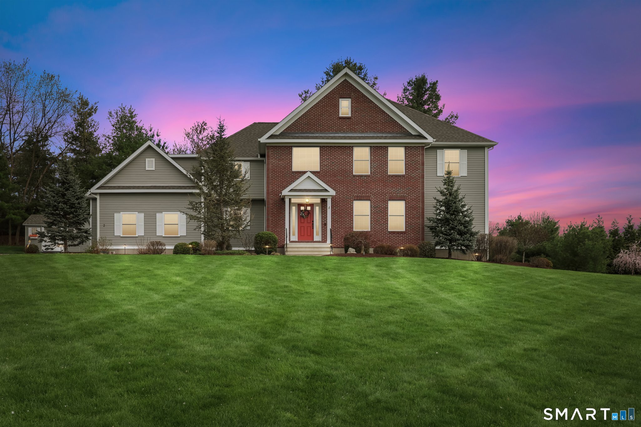 2 Gatehouse Road Granby, CT 06035 - Photo 2 of 40 a front view of a house with a yard