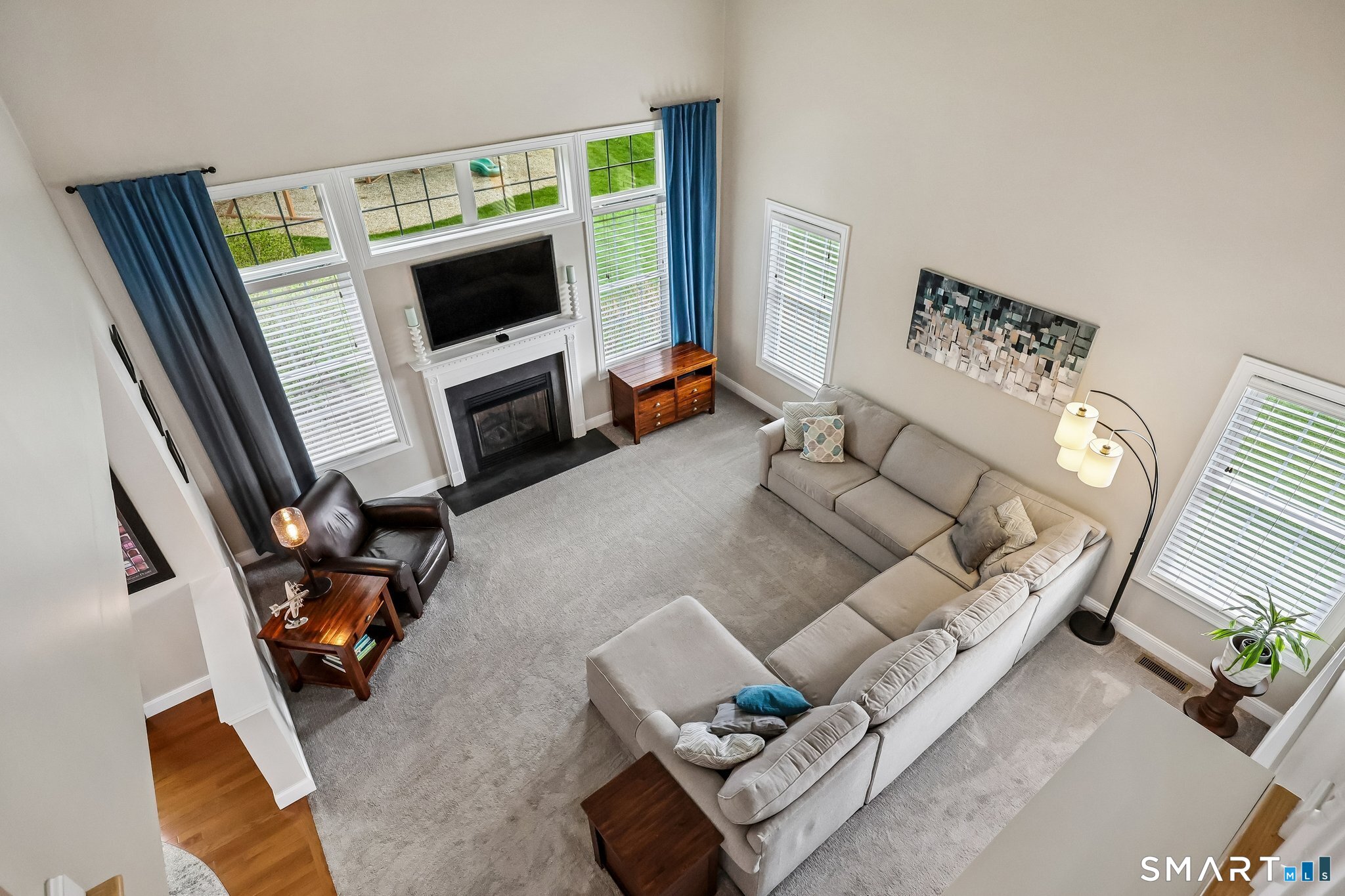 2 Gatehouse Road Granby, CT 06035 - Photo 21 of 40 a living room with furniture and a flat screen tv