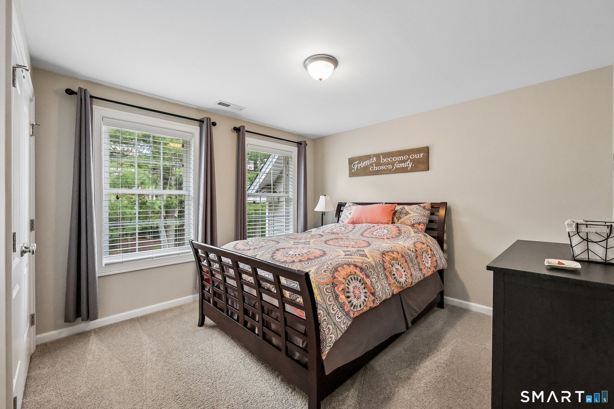 2 Gatehouse Road Granby, CT 06035 - Photo 24 of 40 a bed sitting in a bedroom next to a window