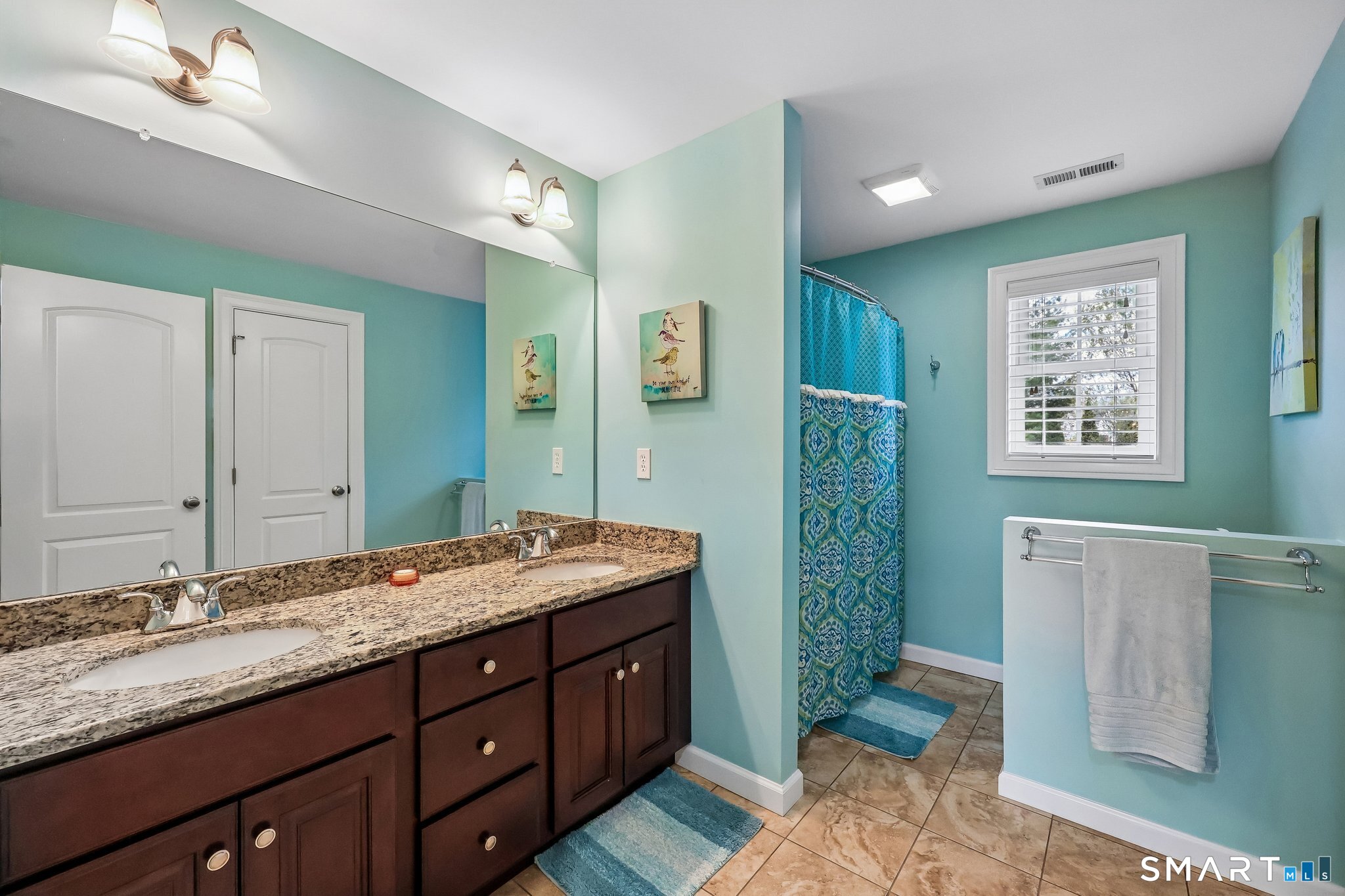2 Gatehouse Road Granby, CT 06035 - Photo 25 of 40 a spacious bathroom with a granite countertop sink mirror and shower