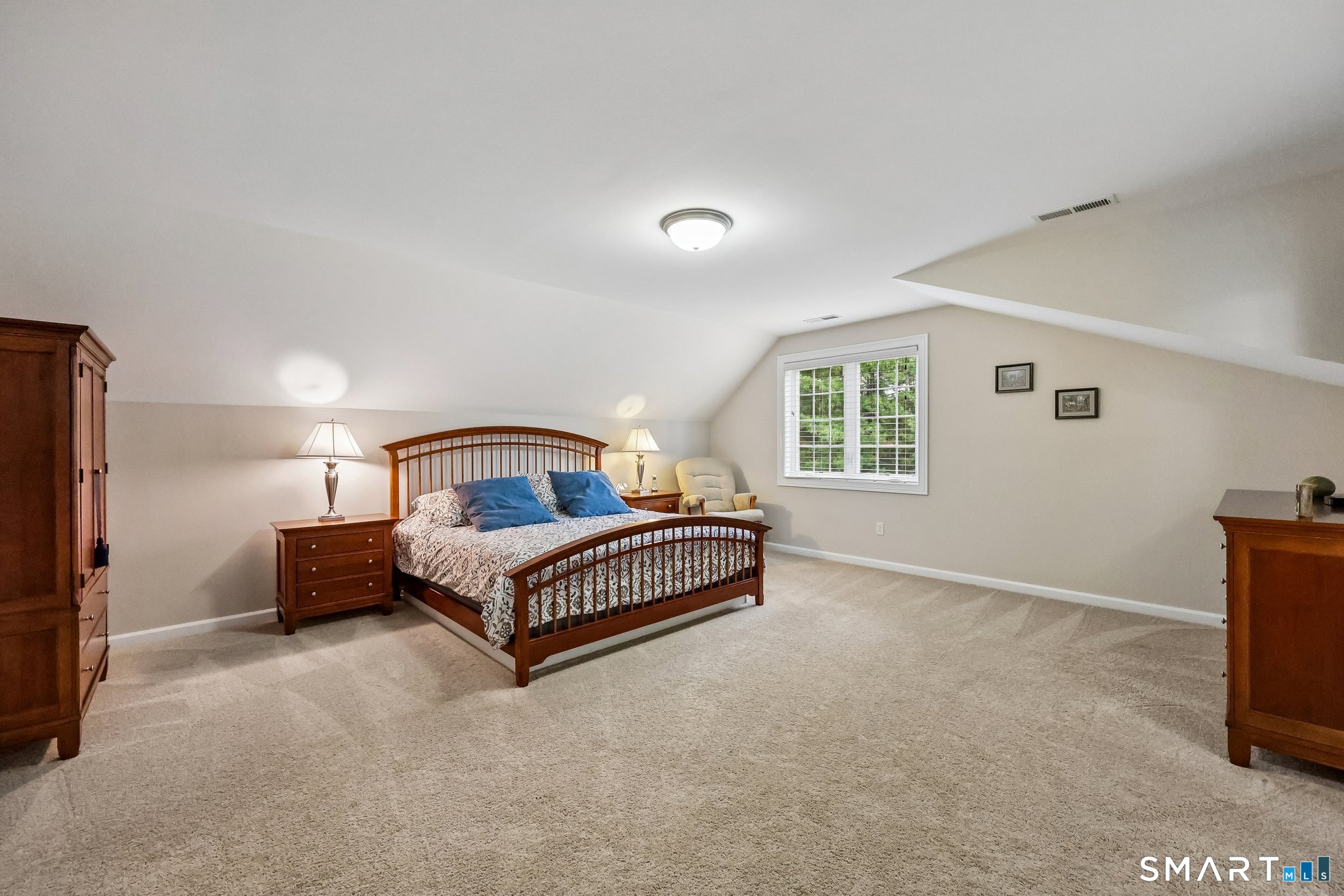 2 Gatehouse Road Granby, CT 06035 - Photo 27 of 40 a spacious bedroom with a bed and a window