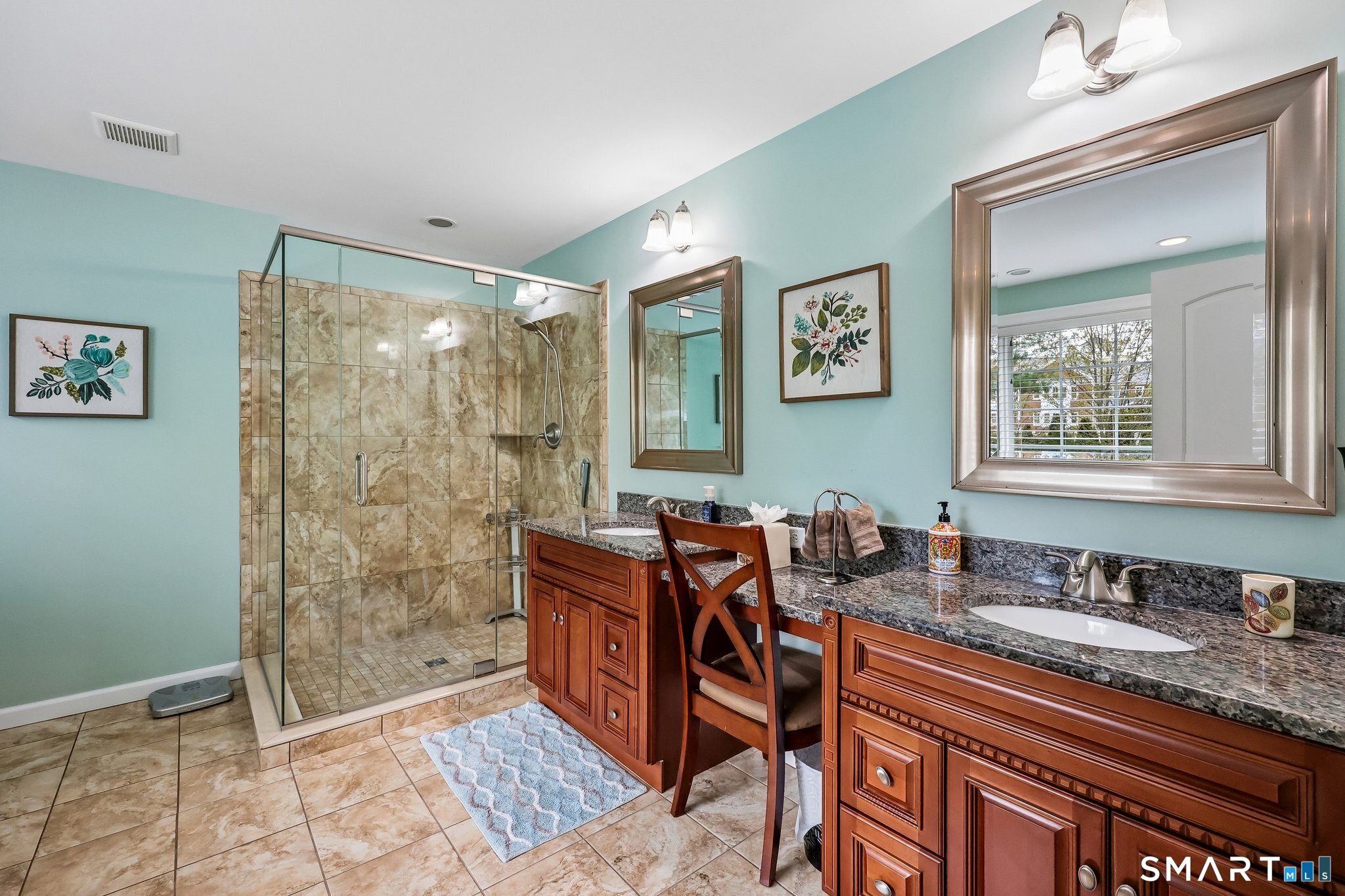 2 Gatehouse Road Granby, CT 06035 - Photo 29 of 40 a bathroom with double vanity sinks a toilet a shower a vanity and a window