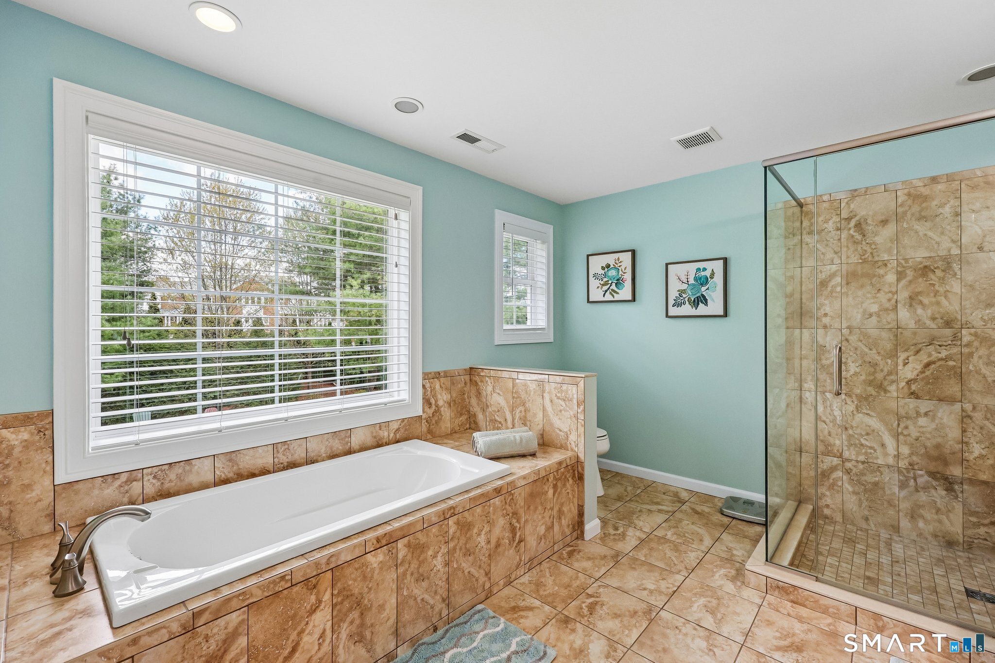 2 Gatehouse Road Granby, CT 06035 - Photo 30 of 40 a spacious bedroom with a bed and a window