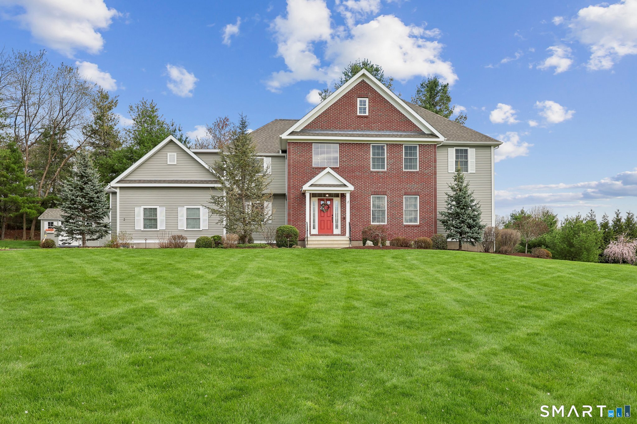 2 Gatehouse Road Granby, CT 06035 - Photo 3 of 40 a front of a house with the garden