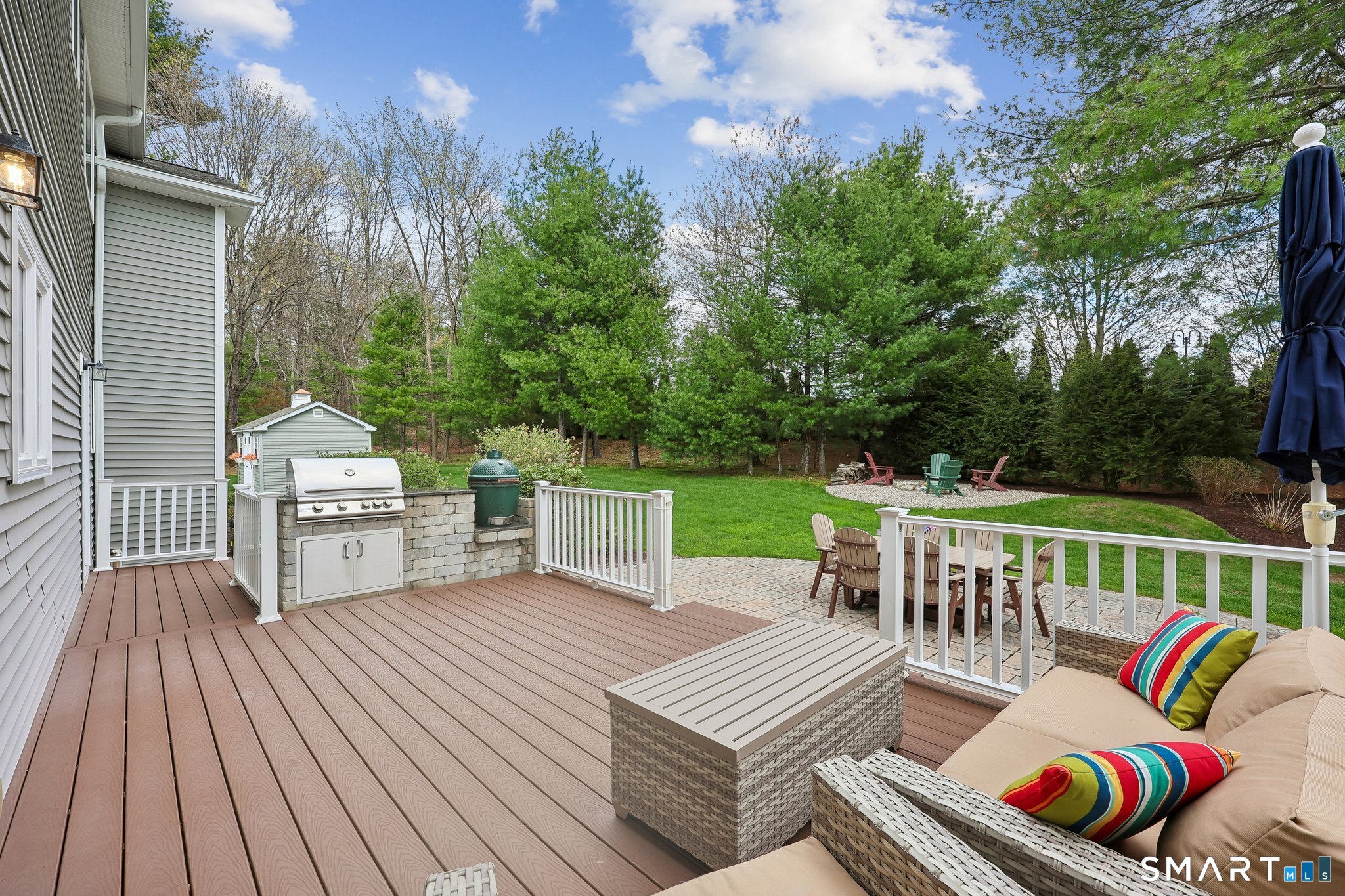 2 Gatehouse Road Granby, CT 06035 - Photo 4 of 40 a view of a chairs and table on the roof deck