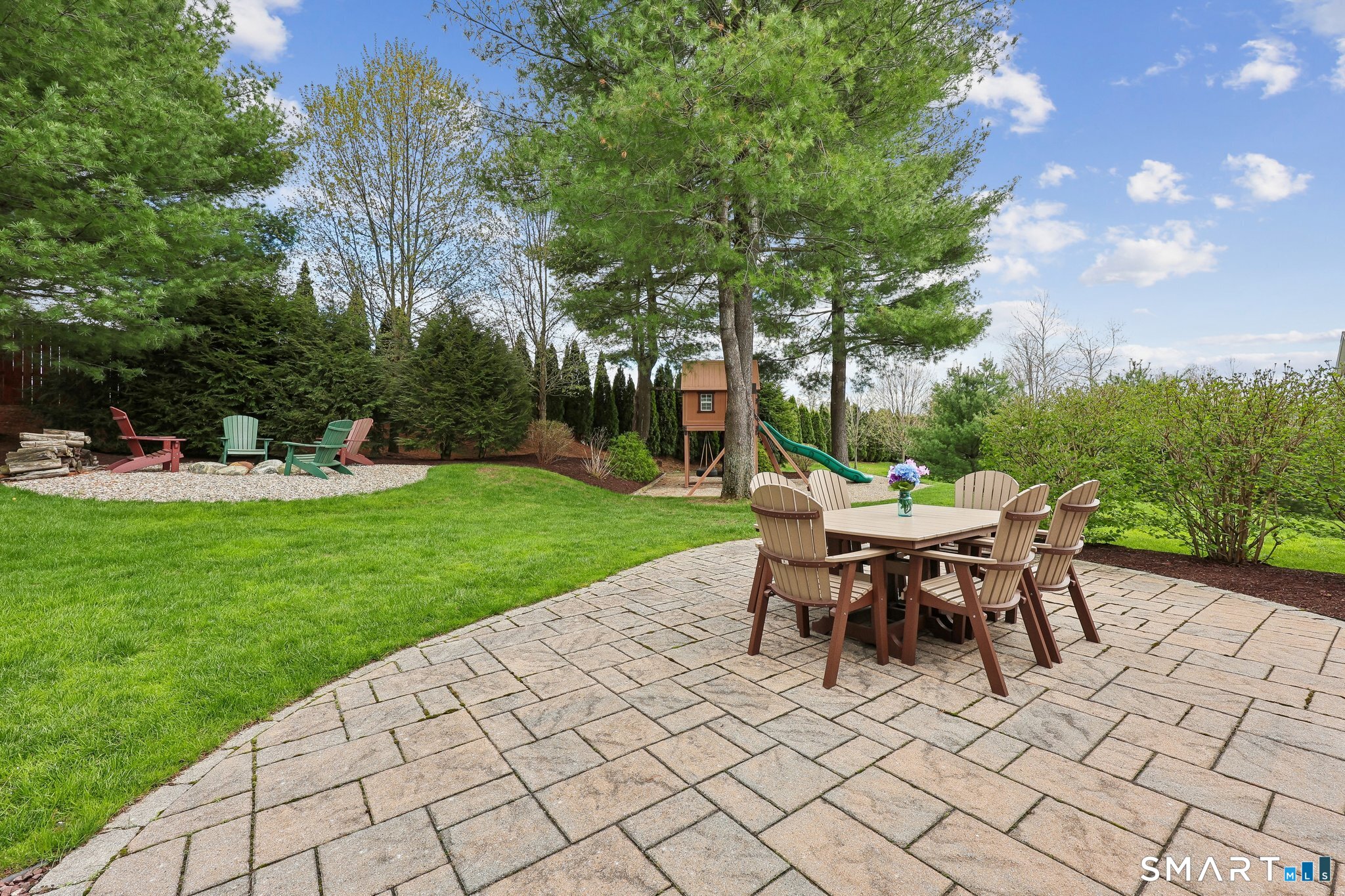 2 Gatehouse Road Granby, CT 06035 - Photo 5 of 40 a view of a backyard with sitting area