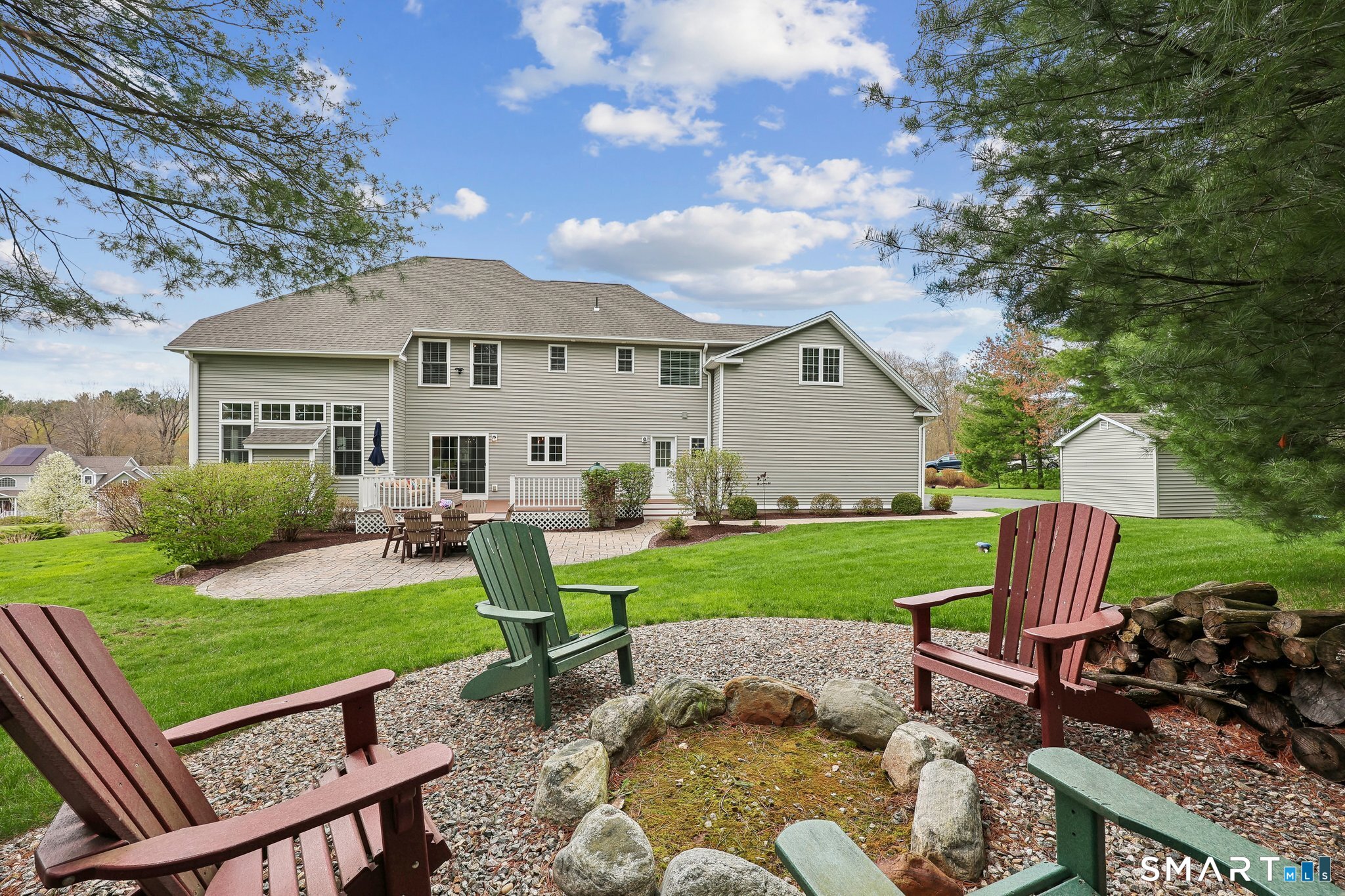 2 Gatehouse Road Granby, CT 06035 - Photo 6 of 40 a view of a house with backyard and sitting area