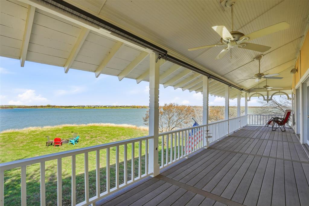 13280 Beach Club Road The Colony, TX 75056 - Photo 33 of 40 a view of a balcony with wooden floor