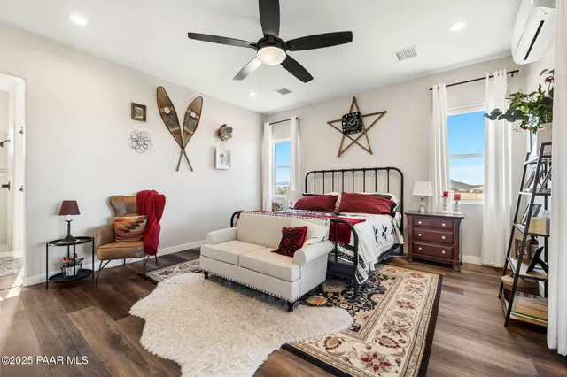 a front view of a house with sitting area