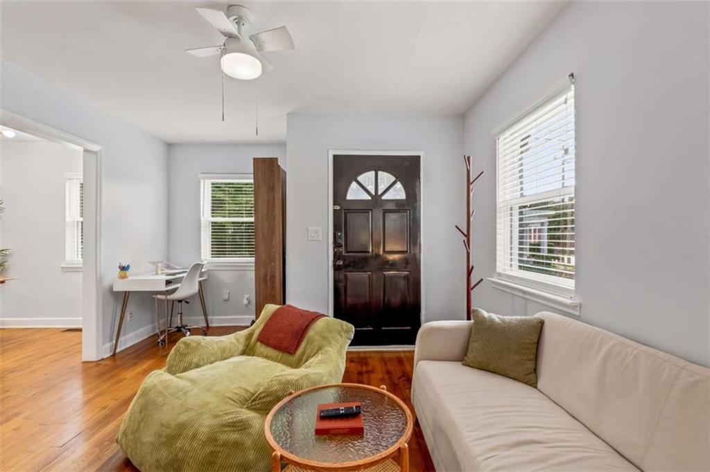 1780 John Calvin Avenue, Unit R College Park, GA 30337 - Photo 10 of 12 a living room with furniture and a window