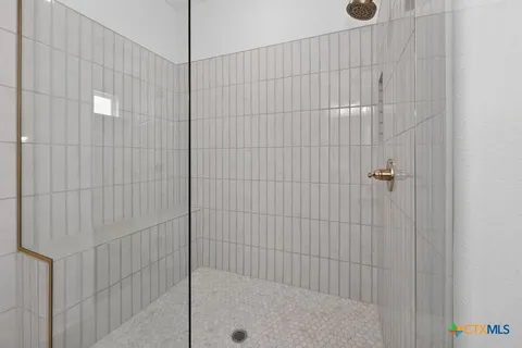 a bathroom with a toilet and a sink