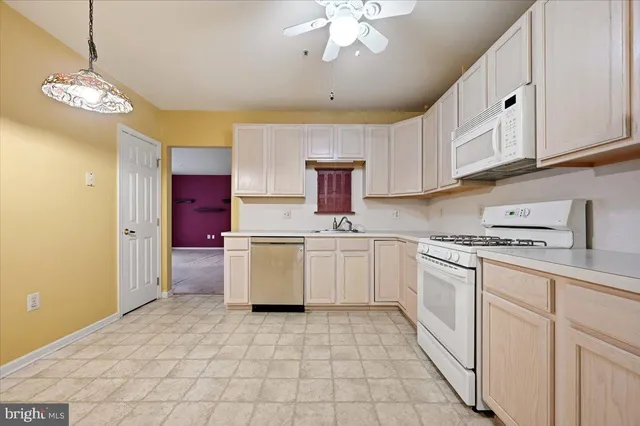 a kitchen with a cabinets and counter space
