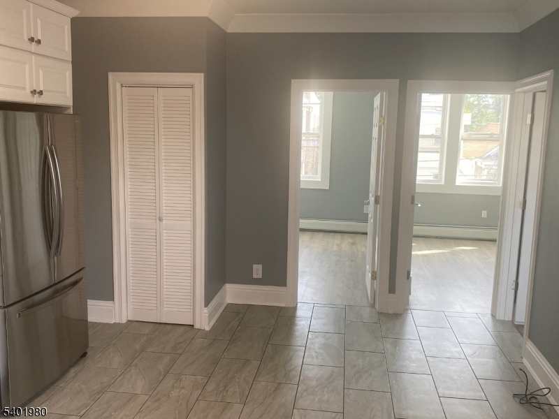 14 Jackson Street, Unit 9 Passaic, NJ 07055 - Photo 3 of 11 a view of an empty room with a window