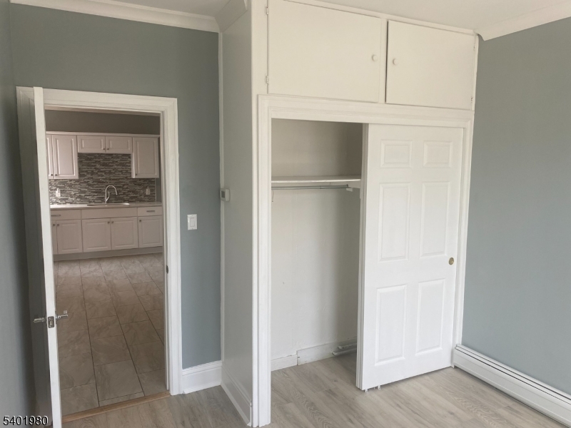 14 Jackson Street, Unit 9 Passaic, NJ 07055 - Photo 8 of 11 a view of cabinets