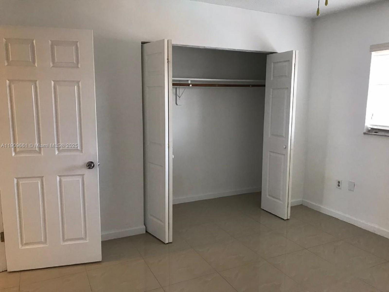 1100 West 35th Street, Unit 27 Hialeah, FL 33012 - Photo 14 of 24 a view of an empty room