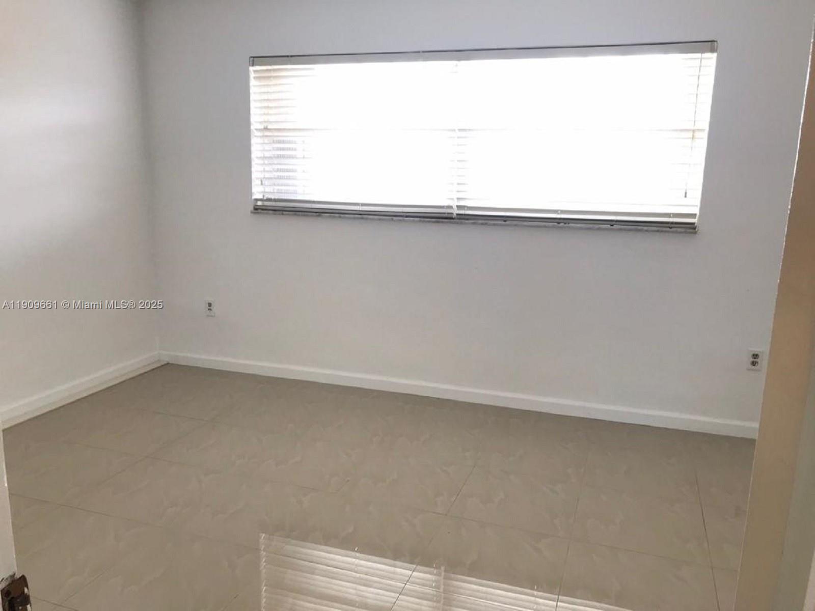 1100 West 35th Street, Unit 27 Hialeah, FL 33012 - Photo 15 of 24 a close up of a window in a room