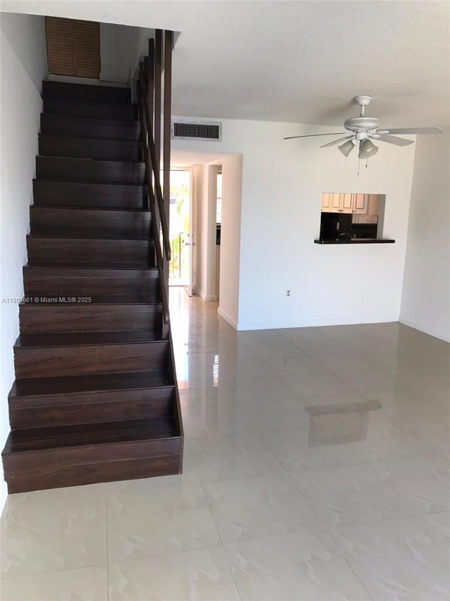 1100 West 35th Street, Unit 27 Hialeah, FL 33012 - Photo 2 of 24 a view of entryway and hall