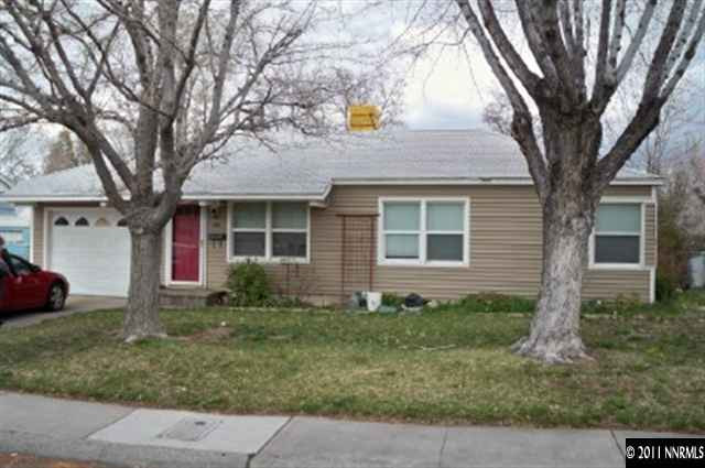 820 Lodge Avenue Reno, NV 89503 - Photo 1 of 9 a front view of a house with garden