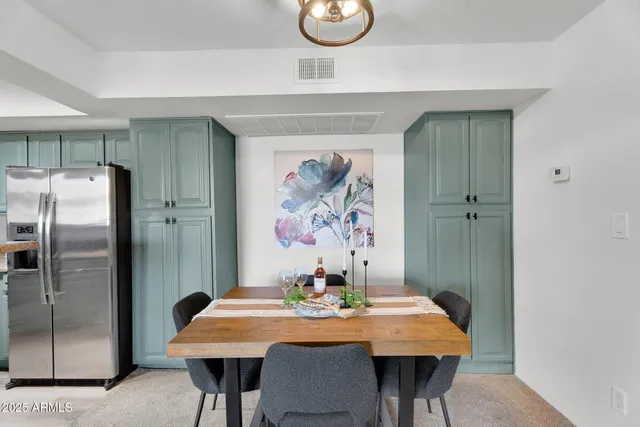 a view of a dining room with furniture