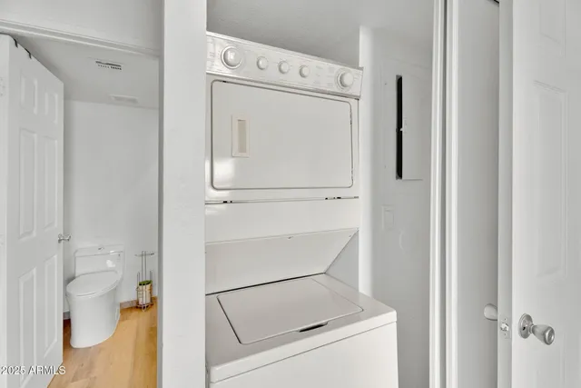 a utility room with dryer and washer