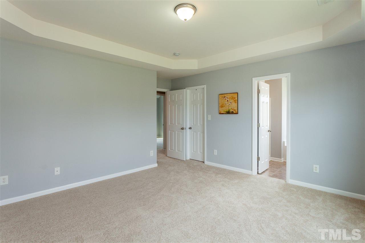1408 Ricochet Drive Raleigh, NC 27610 - Photo 22 of 25 a view of an empty room