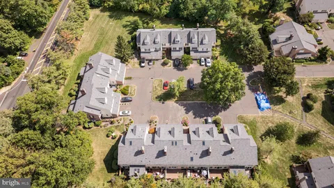 an aerial view of a house with outdoor space