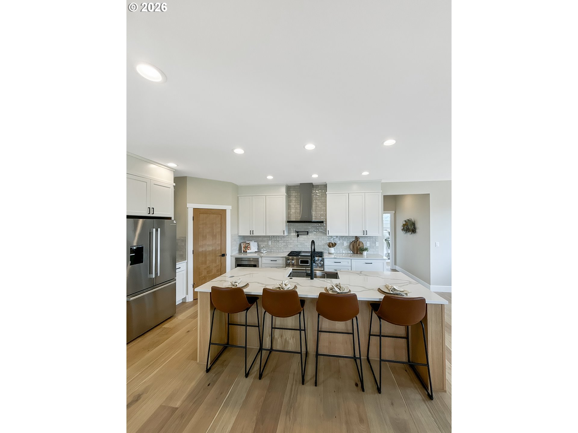 466 Meadows Drive Nehalem, OR 97131 - Photo 11 of 28 a view of a dining room with furniture and wooden floor