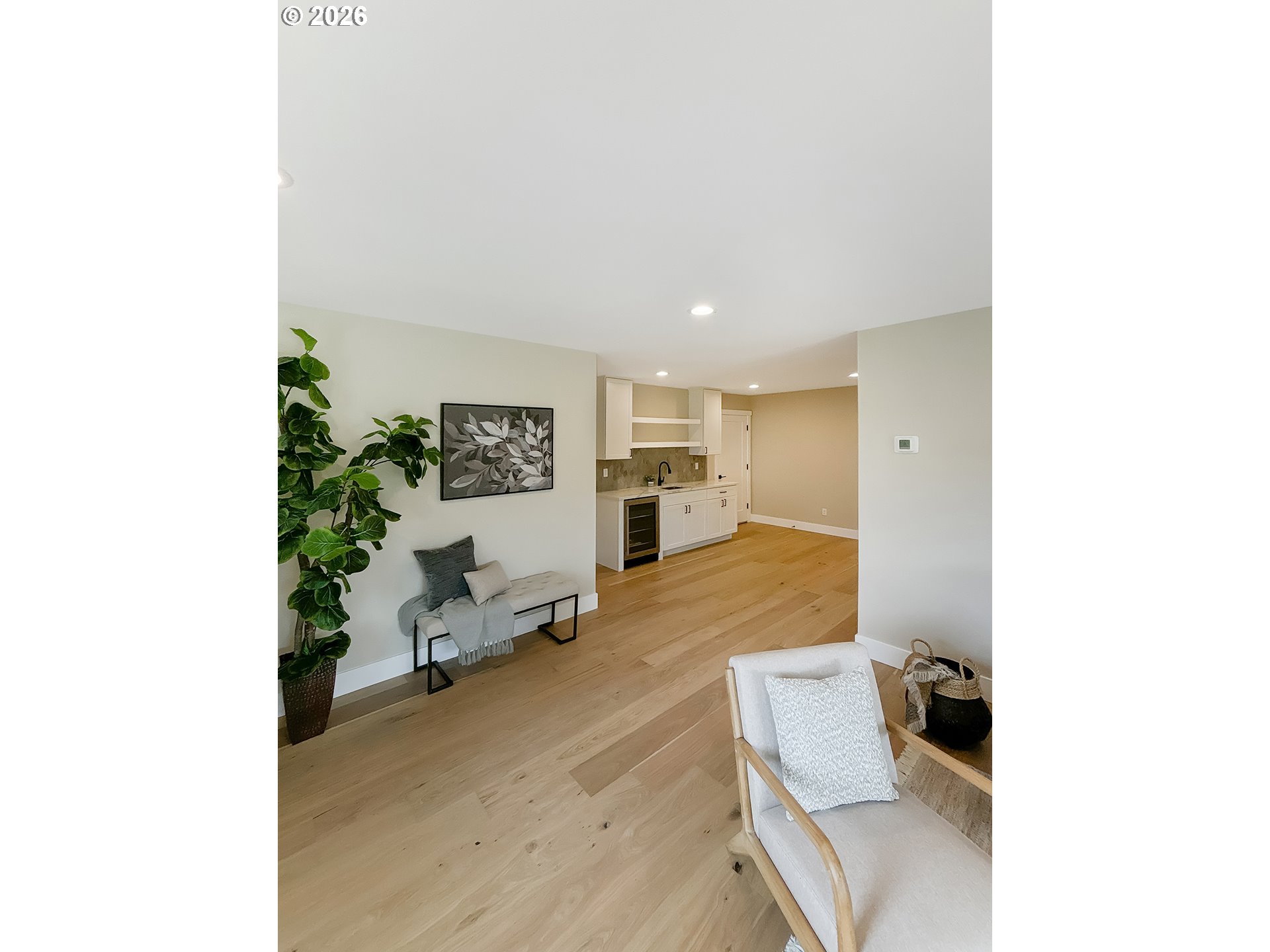 466 Meadows Drive Nehalem, OR 97131 - Photo 21 of 28 a living room with furniture and a potted plant